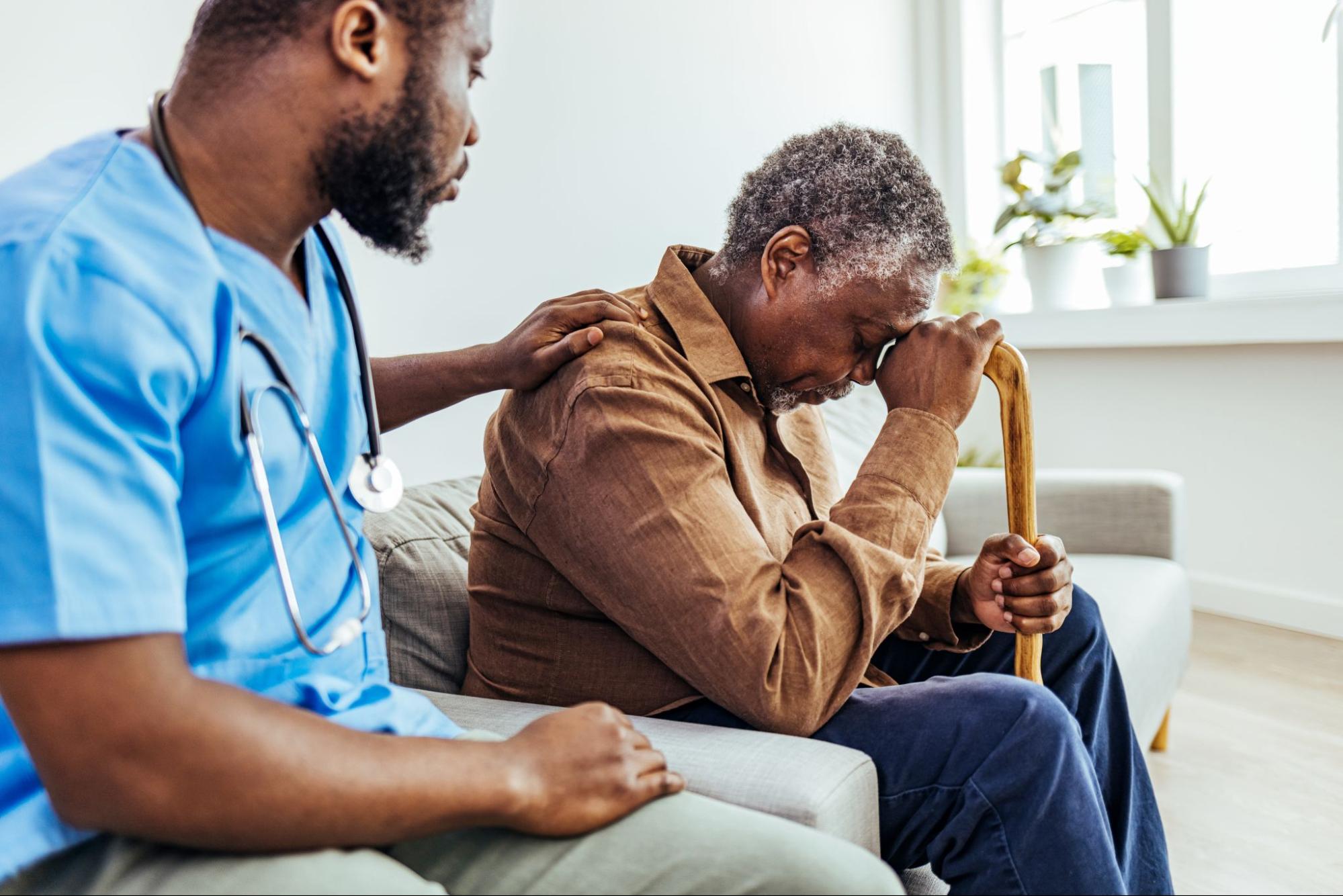 at-home-provider-helping-elderly-person-with-depression-treatment